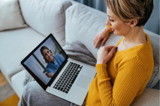 woman on laptop talking to a virtual representative